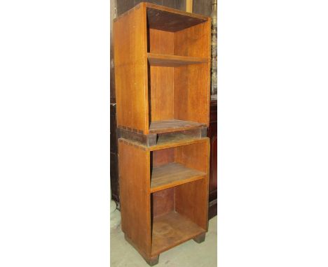 A pair of solid oak lamp tables with open shelves and exposed jointed construction, raised on block feet, 45cm wide x 32cm de