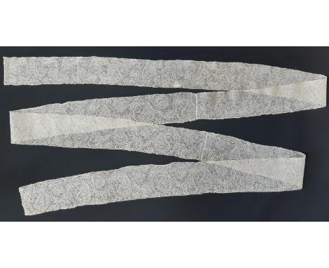 A length of 17th/18th century Valenciennes or Binche bobbin lace; there are 3 joins in the length, which is comprised of 105c