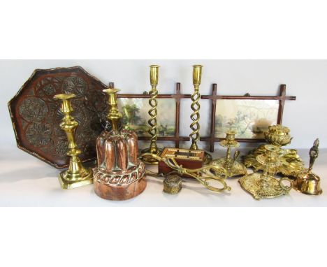 A collection of brass ware, including a pair of spiral twist candlesticks, a pair of 19th century style candlesticks, an elab