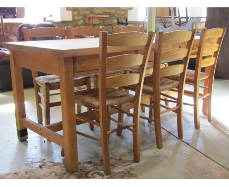 A Habitat Olivia contemporary beechwood farmhouse table with block work top, enclosing six frieze drawers together with six m