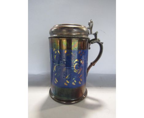 A copper lustre ceramic tankard supporting a French white metal lid and thumb piece, surmounted by a seahorse and a medallion