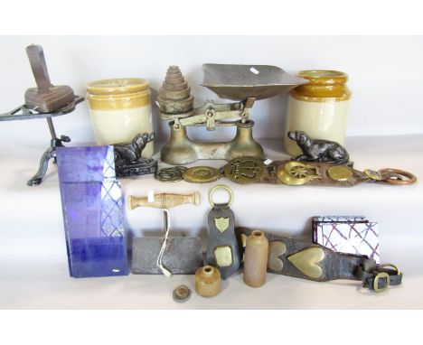 A miscellaneous collection of items including two glazed earthenware jars, a vintage weighing scale, a cast iron iron and tri