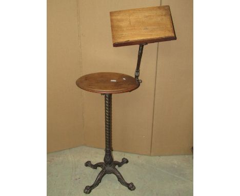 A Victorian reading table in cast iron and mahogany with patent plate detailing the Patent Reading Easel, May be Applied to A