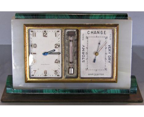 An art deco desk set in onyx and malachite casework displaying clock, thermometer and barometer 