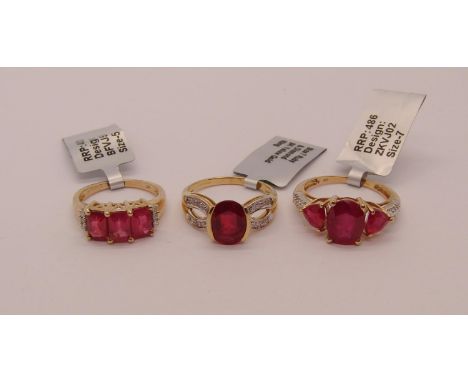 Three 9ct ruby and diamond cluster rings of various design, sizes J - N/O, 8.5g total, one with Coloured Rocks authenticity c