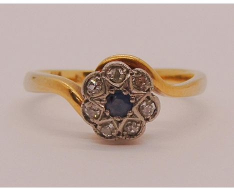 18ct sapphire and diamond cluster crossover ring, size K, 3g 