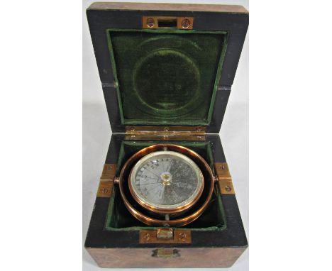 A 19th century travelling compass with a gimbled framework, maker J Browning of London, set within a burr walnut travelling c