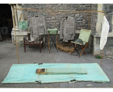 The kit of Capt. E M Lock, Royal Artillery 237536, campaign bed, chairs, washbasin, mosquito frame, helmet, clothing, etc 