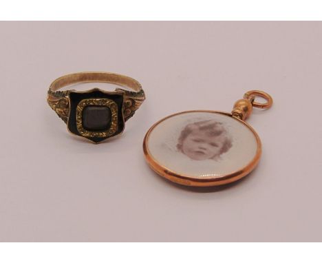 Georgian yellow metal mourning ring with black enamel detail, together with an Edwardian 9ct picture fob (2) 