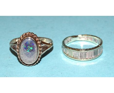 A 9ct gold ring set opal and a 9ct tri-colour gold ring, 5.6g, (2). 