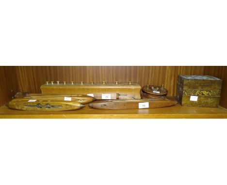 A vintage boxwood foot measure marked A&amp;M, three wooden loom shuttles and other wooden items. 