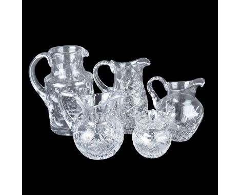 Grouping of Five (5) Vintage Crystal Tableware. Includes: 4 pitchers and 1 mustard/jam jar. Tallest pitcher is signed. covere