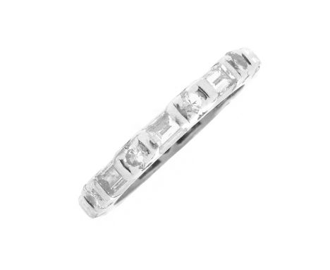 Antique Approx. 1.20 Carat TW Baguette and Round Cut Diamond and Platinum Eternity Band. Diamonds E-F color, VS1-VS2 clarity.