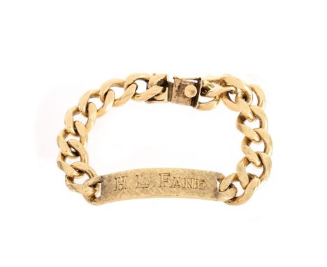 Man's Vintage Heavy 14 Karat Yellow Gold ID Bracelet. Stamped 14K. Measures 8-1/4" L, 7/16" W. Approx. weight: 77.1 grams. Co