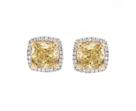 Approx. 3.63 Carat TW Cushion Cut Fancy Yellow Diamond and 18 Karat White Gold Ear Studs. Stamped 750. Approx. weight: 4.3 gr