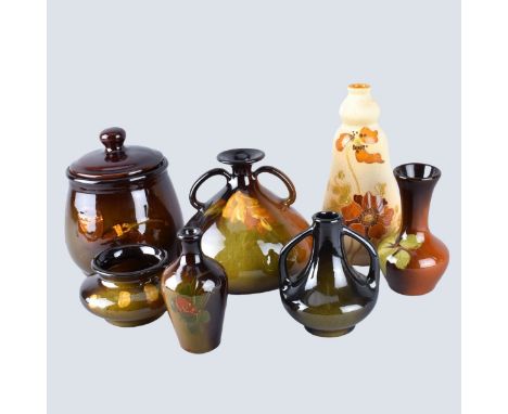 Seven (7) Pieces Roseville Rozane Art Pottery. Lot includes: Woodland vase 7-1/2" H; Tobacco jar 6" H; 2 handled vase 5-1/2" 