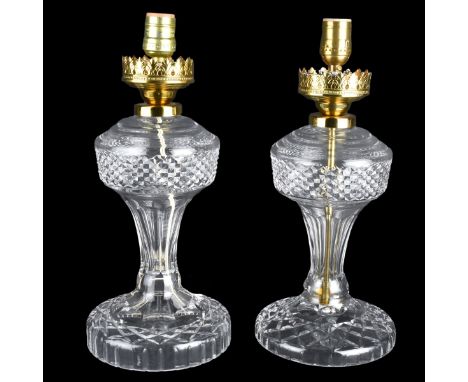 Two of Waterford Inishturk Crystal Hurricane Lamps. Oil lamp style, electric. Signed. Measures 22-1/2" H x 7", 22" H x 7". Co