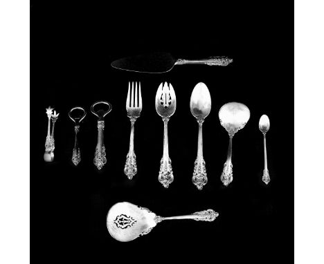 Twelve (12) Wallace Grande Baroque Sterling Serving Pieces. Includes: slotted spoon; 2 serving spoons, 2 meat forks, tomato s