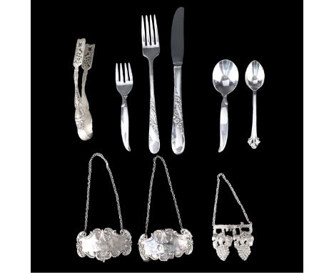 Lot of Assorted Silver and Non-Silver Items. Lot consists of spoons, forks, liquor decanter tags, 1 sugar tong, and 1 knife. 