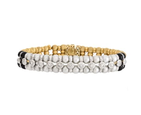 Contemporary Italian Zancan 18 Karat Yellow and White Gold, Diamond, Pearl and Black Onyx Bracelet. Signed, stamped 750, Ital