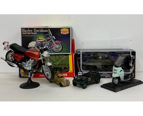 A small selection of Diecast vehicle some boxed, to inclde Foden Army Truck, Harley-Davidson Electra-Glide, etc 