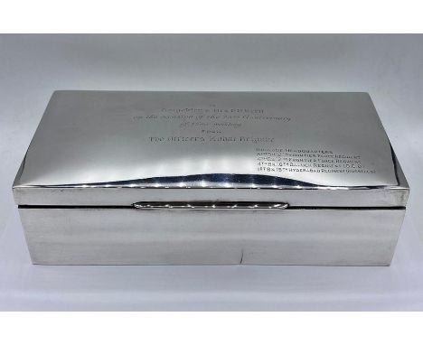 A Substantial silver cigarette box by Hamilton &amp; Co of Calcutta (H7cm W24.5cm D12cm)