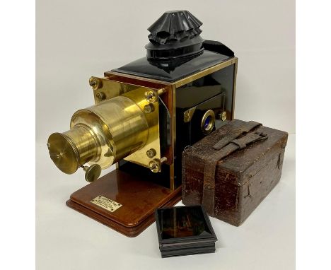 H Luscombe Toms magic lantern along with slides.