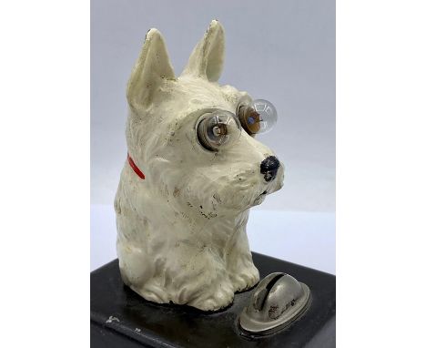 A Vintage West Highland Terrier on battery base with light up eyes.