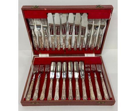 A cased twelve place setting of fish knives and forks. Battle Axe marked on knives. 