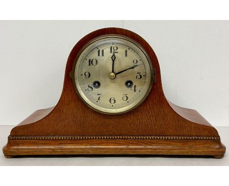An Eight Day dome top mantle clock