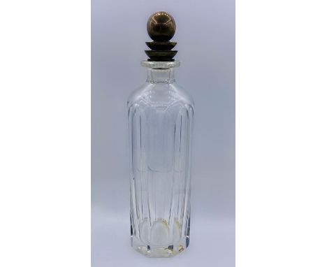 A Vintage Georg Jensen Pyramid Baccarat Decanter. The Baccarat panelled crystal decanter, etched to base comes with the sterl