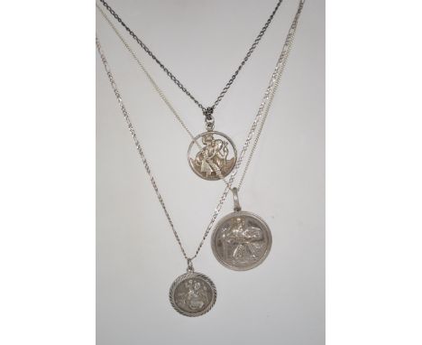 A group of three sterling silver 925 necklace chains each having St Christopher pendants. Total weighs 20.4 grams.