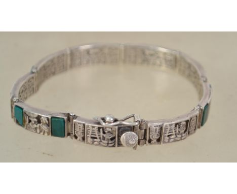 A fantastic sterling silver 925 oriental inspired panel bracelet, having jade and silver pictorial panels. Measures 7 inches 