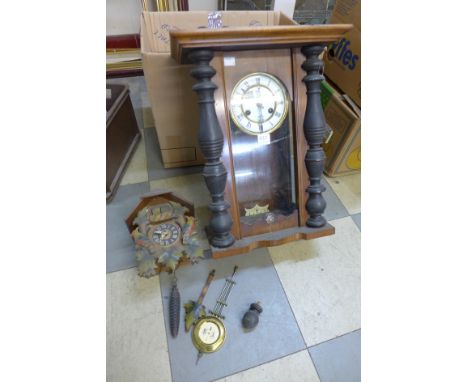 A cuckoo clock and a Vienna wall clock