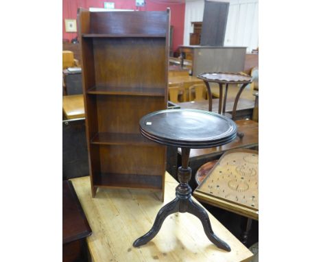 A mahogany book shelf and wine table