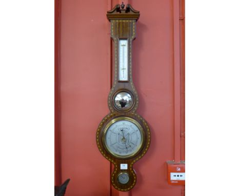 An inlaid mahogany aneroid barometer