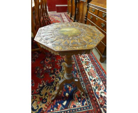 A 19th Century Black Forest carved softwood tripod table, the octagonal top painted with Alpine landscape within border of 22