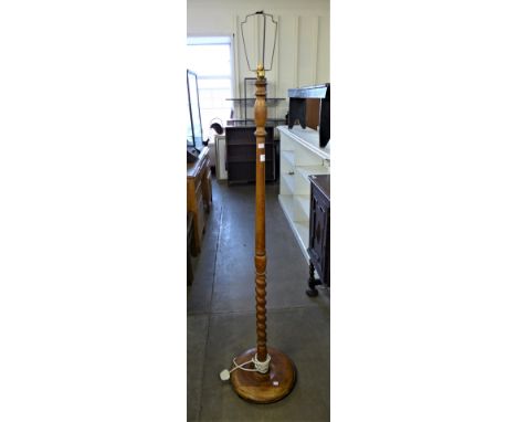 An oak barleytwist standard lamp