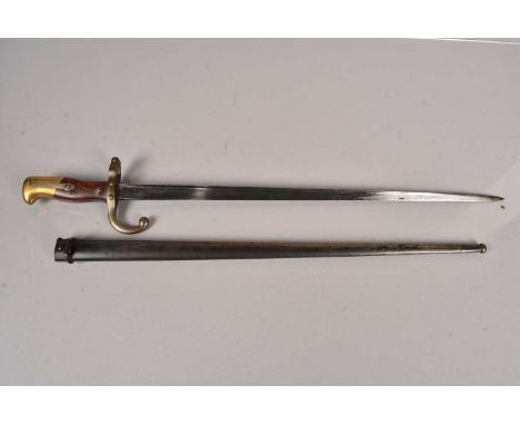 An 1876 dated French T-Back bayonet, having serial number 7293 to the guard, plus other proof stamps, complete with scabbard 