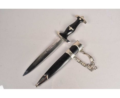 A Reproduction German SS Dagger, with etched blade, complete with scabbard and hanger