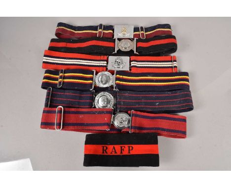 A group of British Coloured Regimental Stable belts and buckles, comprising the Royal Air Force Police, Royal Engineers, Roya