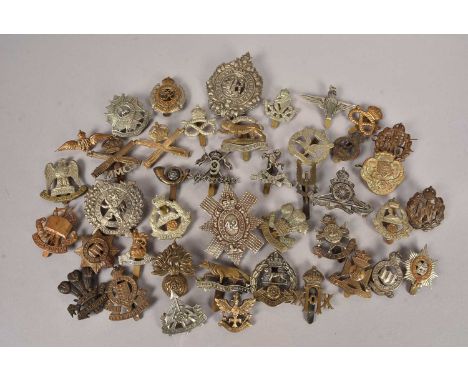 A collection of British Regiment cap badges, WWI and later, comprising 8th (Irish) Battalion The Kings Regiment Liverpool, Th