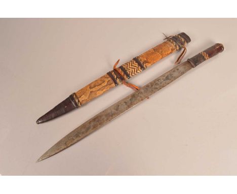 An African sidearm, having 49cm long single edged blade, with leather and reed bound grip, having reptile skin and leather co