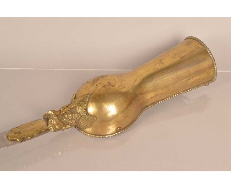 A late 19th Century/ early 20th Century Indian Gauntlet sword (Pata), having gilt guard with bead tyle edging, with wooden fi