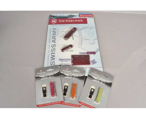 Victorinox - Accessories, a three piece Multi-Function Combo Set, together with three USB Flash Drive sets, in Green, Orange 