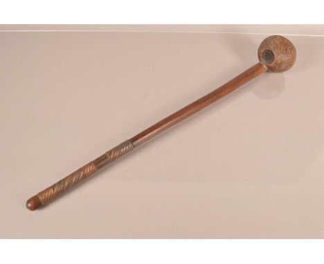 An African Hardwood Knobkerrie, with 58cm long shaft, with bulbous head, 9cm in diameter, with chamfered design, the shaft ha