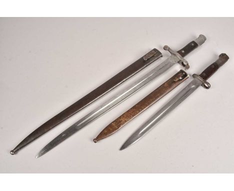 A Portuguese Kropatschek bayonet and scabbard, having X806 to the cross guard and CC831 to the steel scabbard, together with 