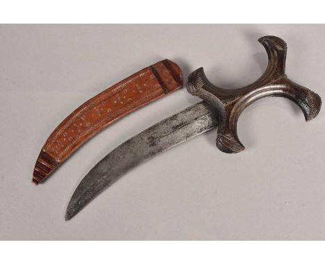 A 19th Century Hadendoa Dagger, having 21cm curved blade, with shallow diamond section, with H-Shaped carved grip, complete w