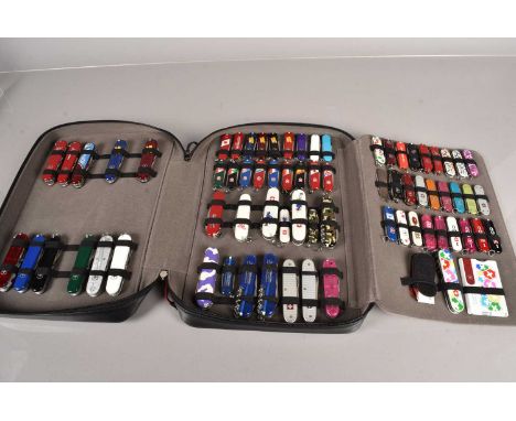 Victorinox - Collector's Case, containing 70+ various Swiss Army Knives, including a silver hallmarked example (Birmingham 19