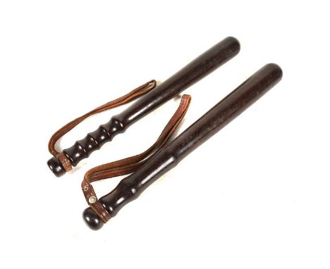 A Vintage Special Constable wooden truncheon, being stamped 'SCC', with turned wooden grip, 39cm, together with a City of Lon